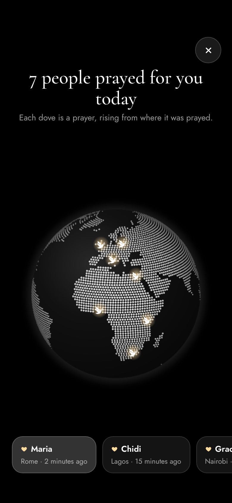 A globe with doves rising from the places people prayed
